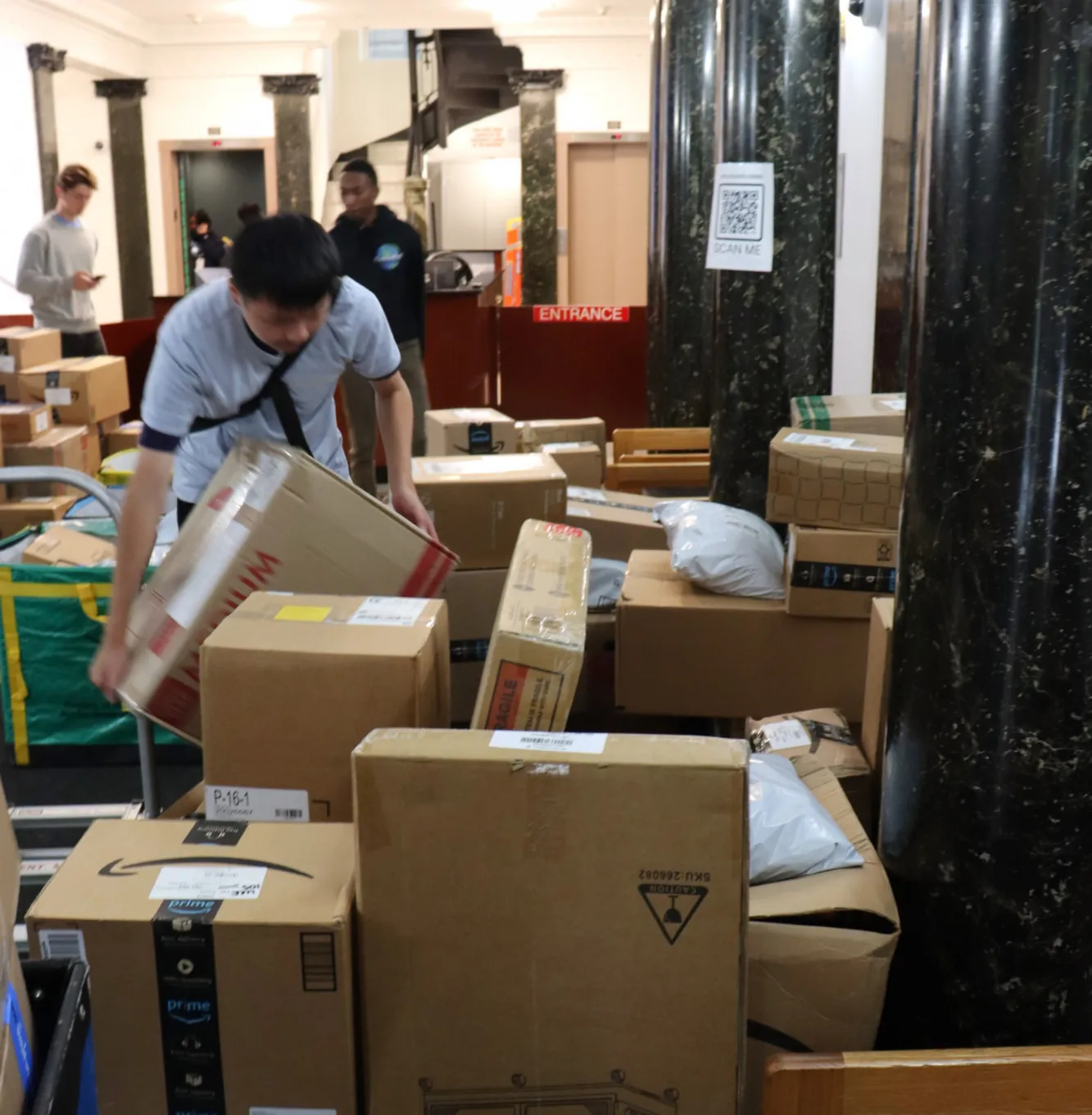Packages being sorted in lobby of Carlton Arms
