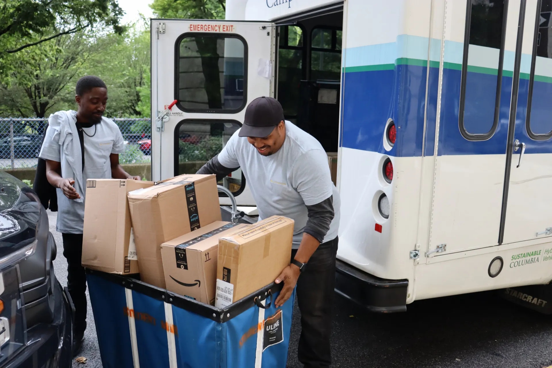 Packages being unloaded from van at Carlton Arms