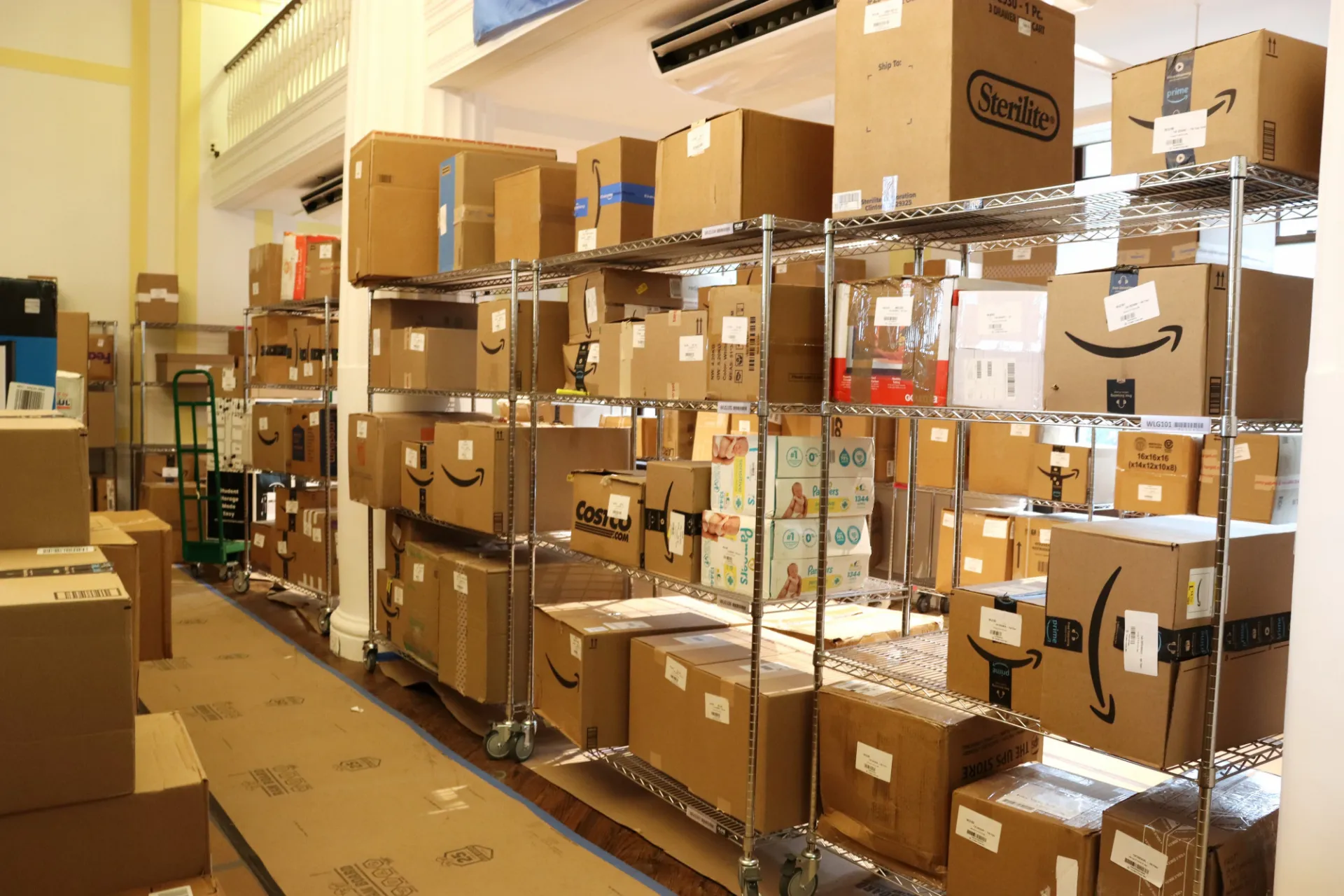 Packages on shelves in Wien Hall lounge